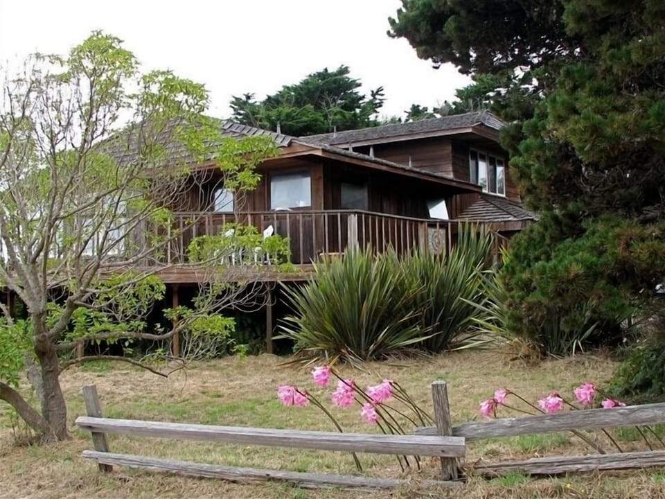 Large craftsman home showcasing native redwood paneling.