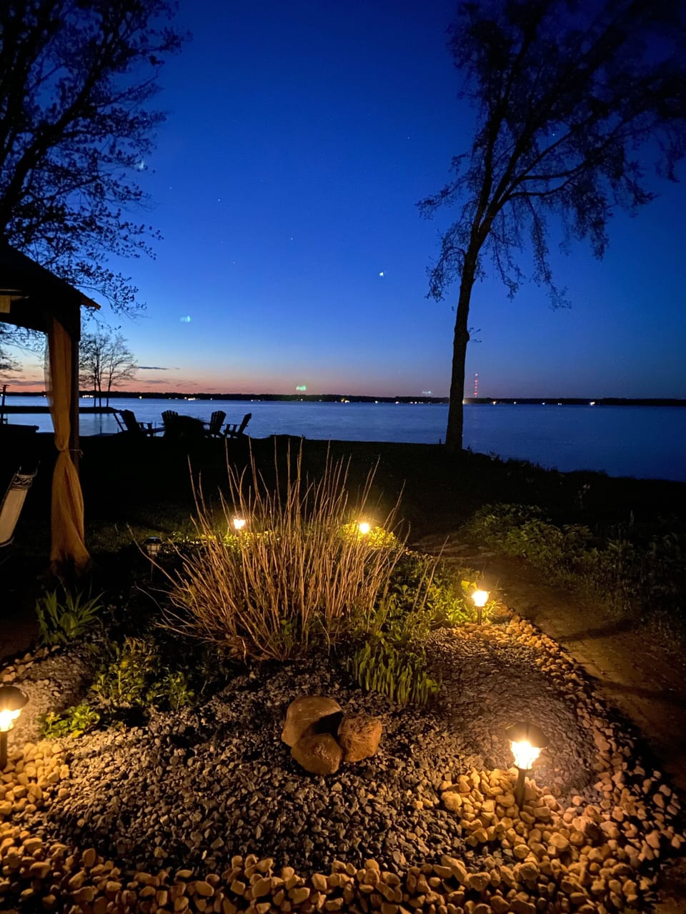 Beautiful View  of the lake from the yard at night.
