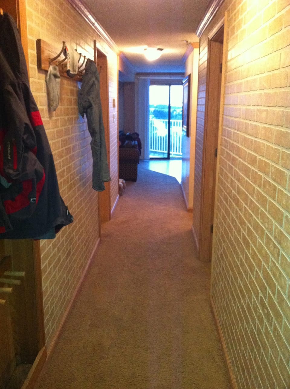 Entry hall w/ ski and coat rack
