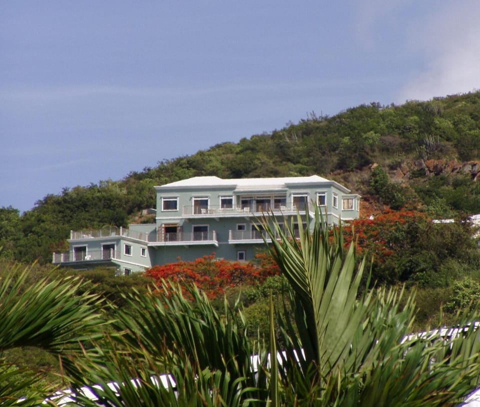 As seen from the closest beach at Bolonga Bay Resort. Apartment is lower left.