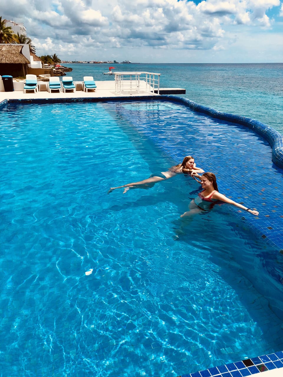 The pool is long enough to swim laps with a jet spa and sunbathing shelf