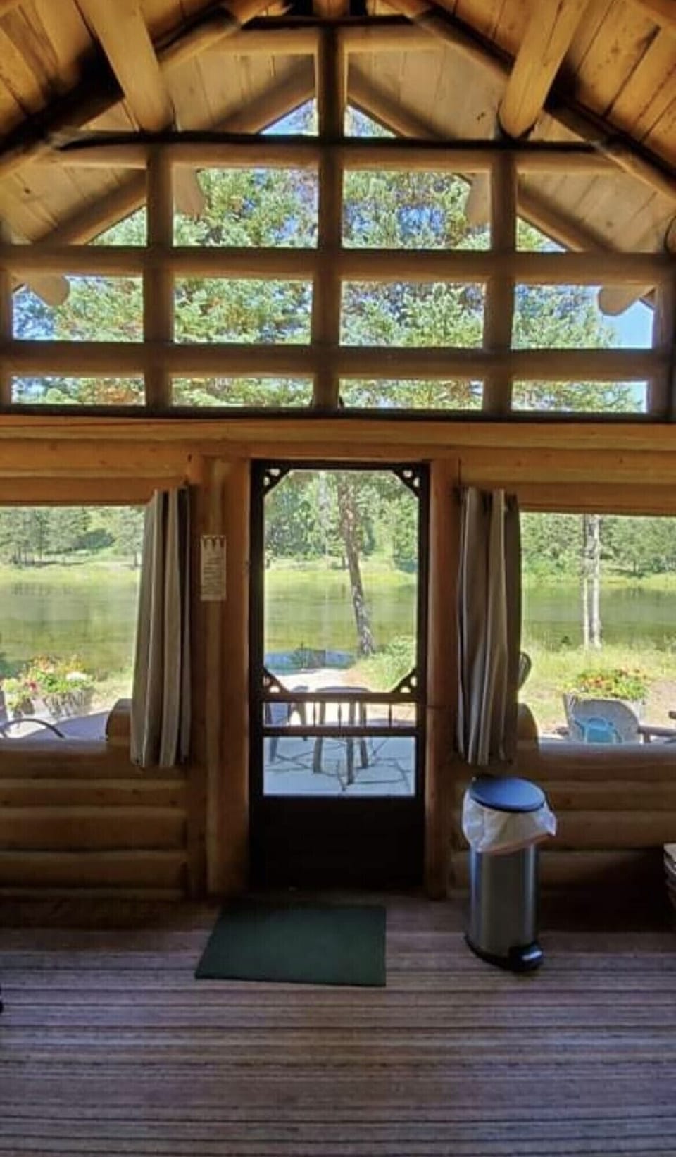 Inside the screened porch looking toward the river. 