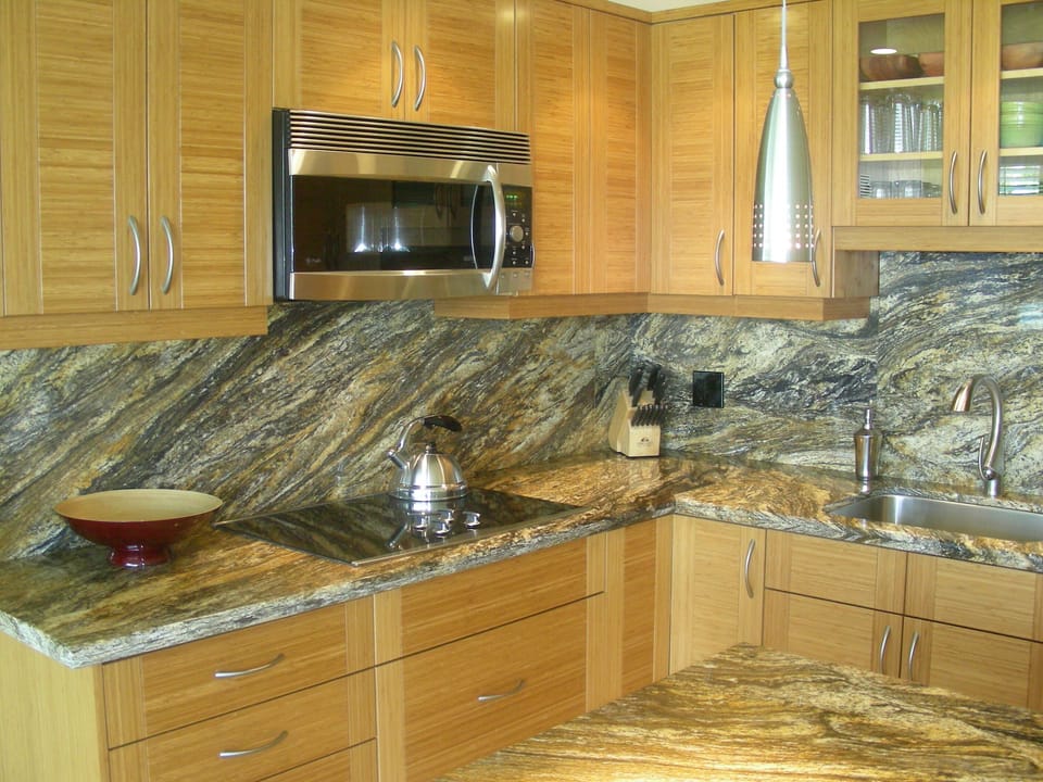 Custom granite countertops and Full backsplashes makes this kitchen a delight.