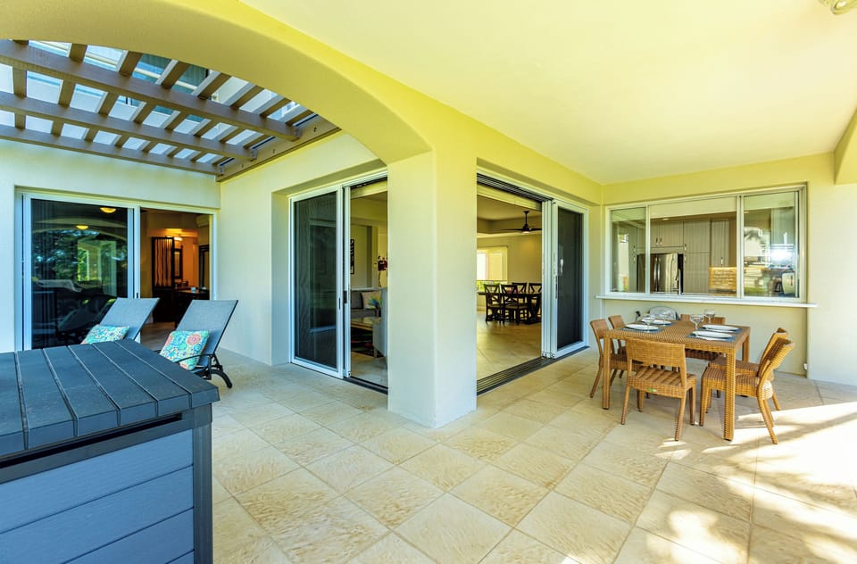 The 400 sq ft large lanai wraps around the living room. You have two chaise lounges, dining seating for six and a beach gear storage unit (contains beach chairs, boogie boards and a cooler)