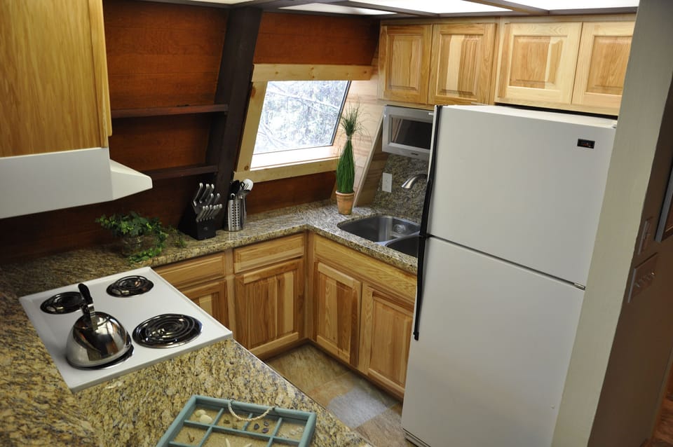 The cozy, fully stocked kitchen has everything you need for a gourmet meal