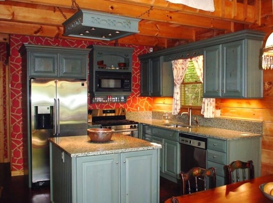 Spacious, fully stocked kitchen with granite countertops. Perfect for you.