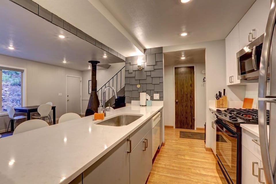 All new kitchen counters, cabinets, utensils, pots/pans, dishes, fridge.