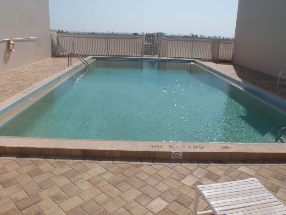 Brand new pool with beautiful tile surrounding it. 