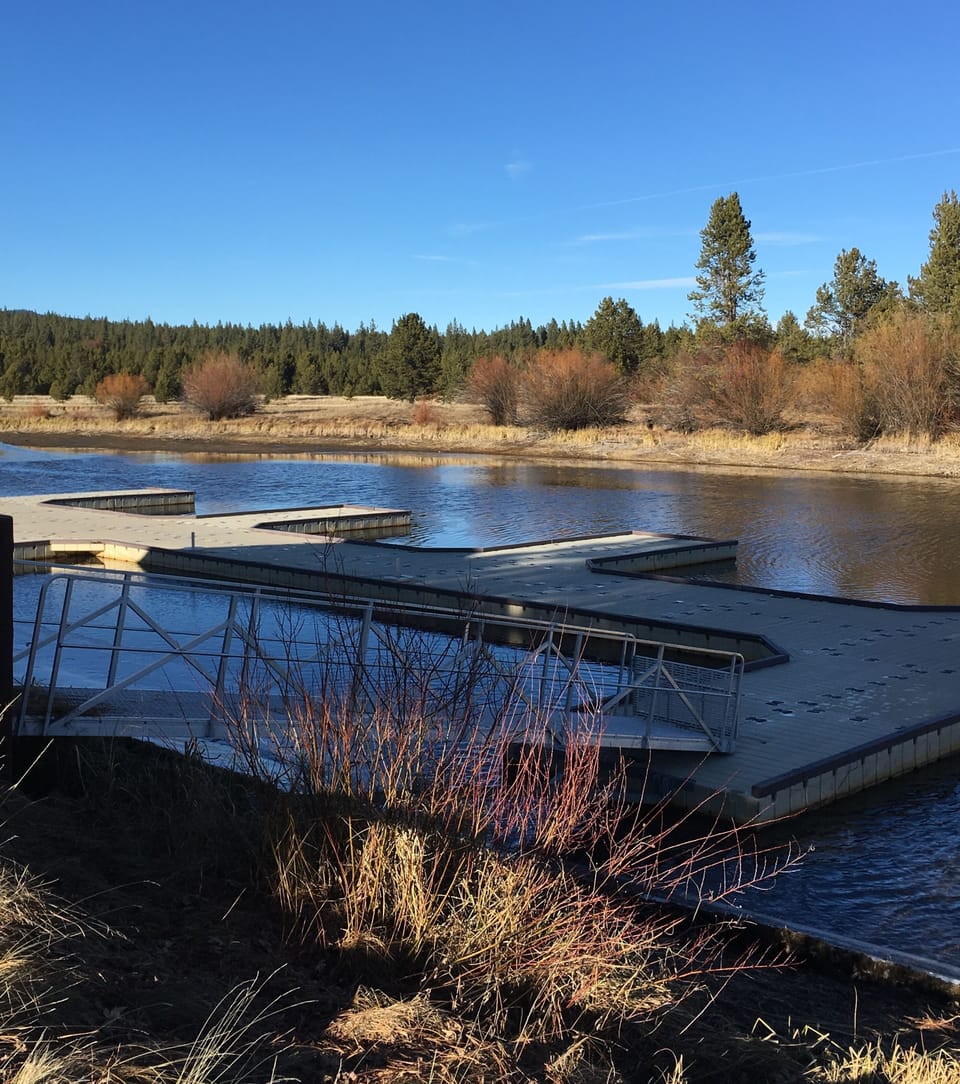 Follow the  path & go to the marina. Show the SHARC pass & put your boat in!