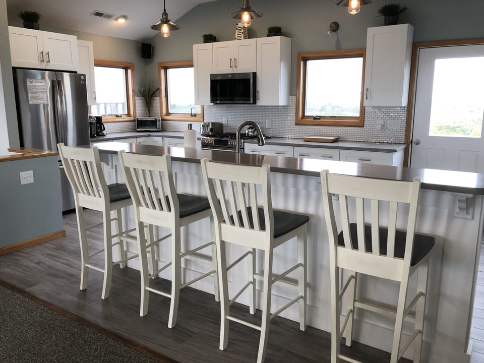 Four seats at the kitchen/bar counter