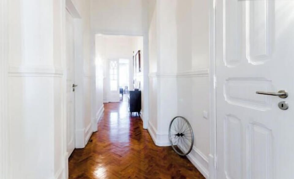 View of the hallway from the opposite end. 