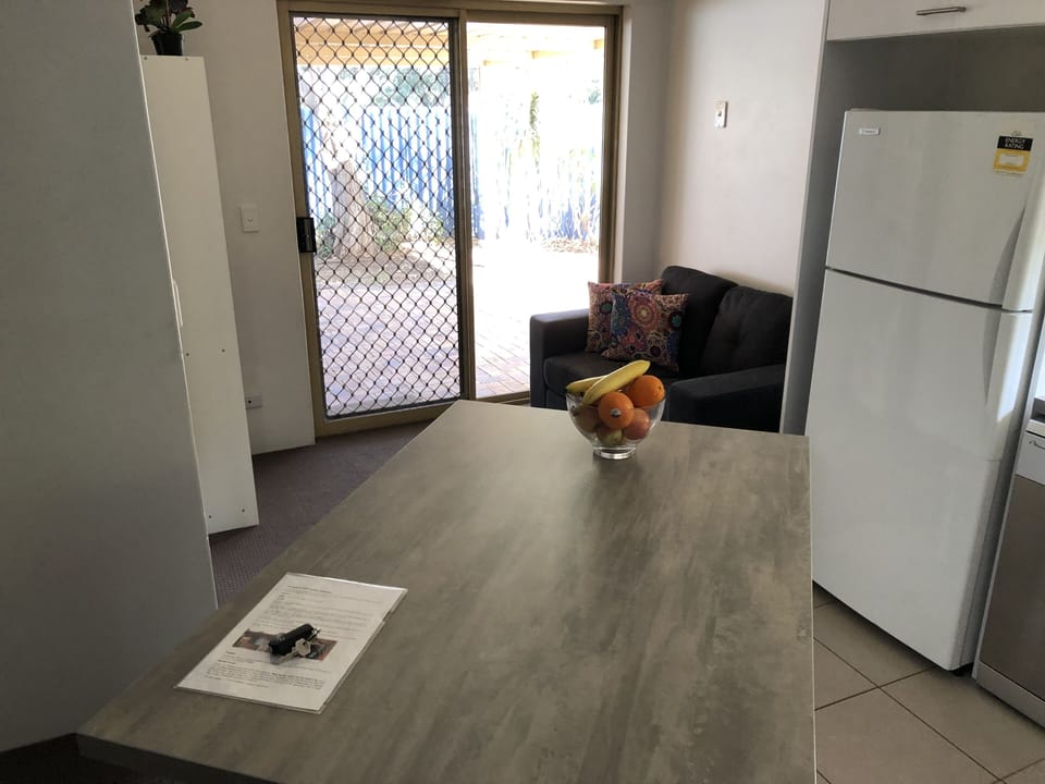 Second seating area in open plan kitchen diner