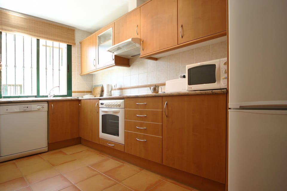 Kitchen area - which as adjoining utility room