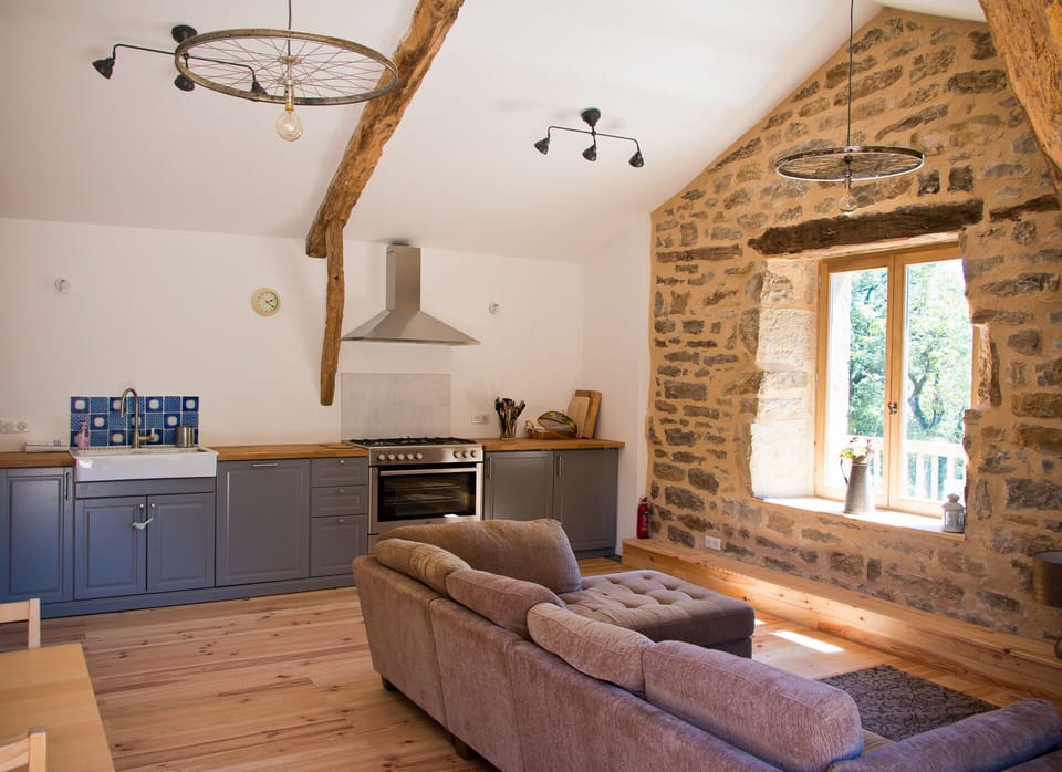Open plan kitchen equipped with dishwasher,  & range ov