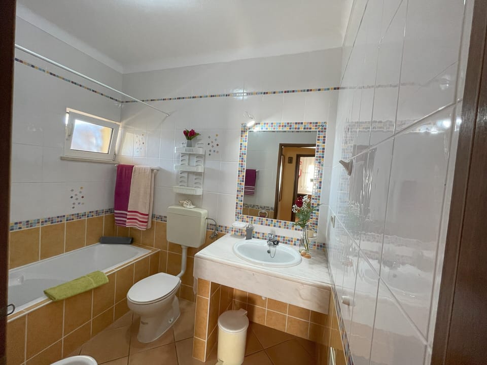 Full bathroom with bath & shower