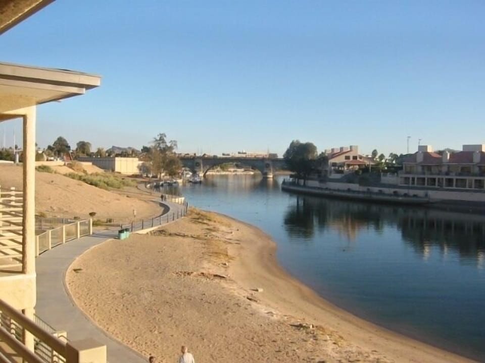 Walkway along beach to London Bridge, numerous shops, movies and restaurants