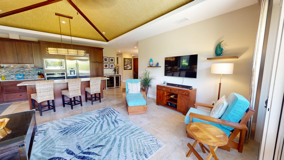 Spacious open concept living area provides lots of space for families or couples