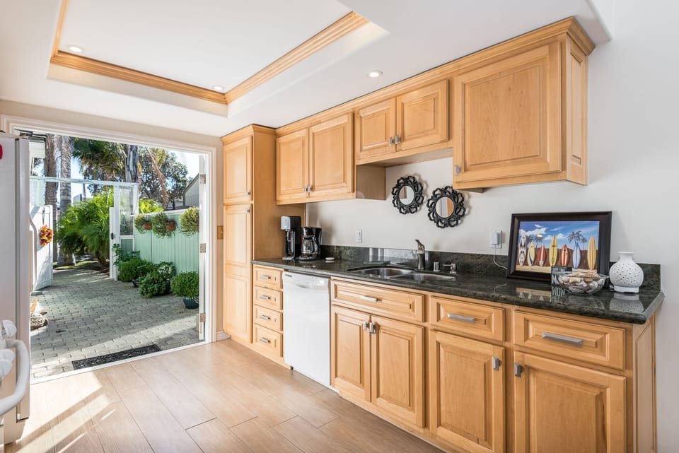 Kitchen full stocked and double doors to private patio.  