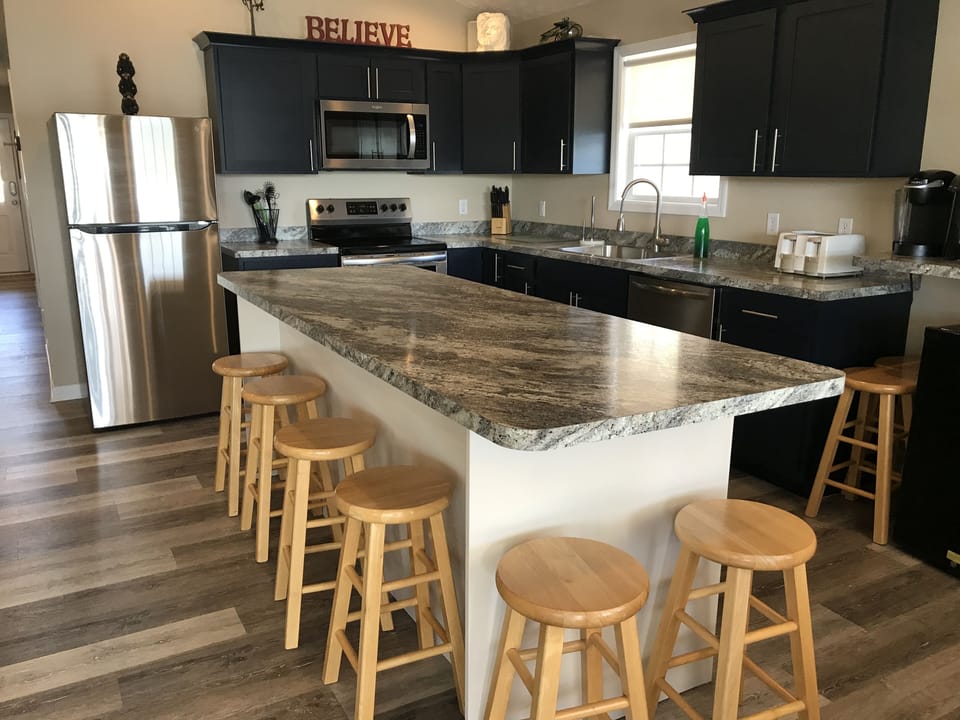 Plenty of stools around the bar for everyone.