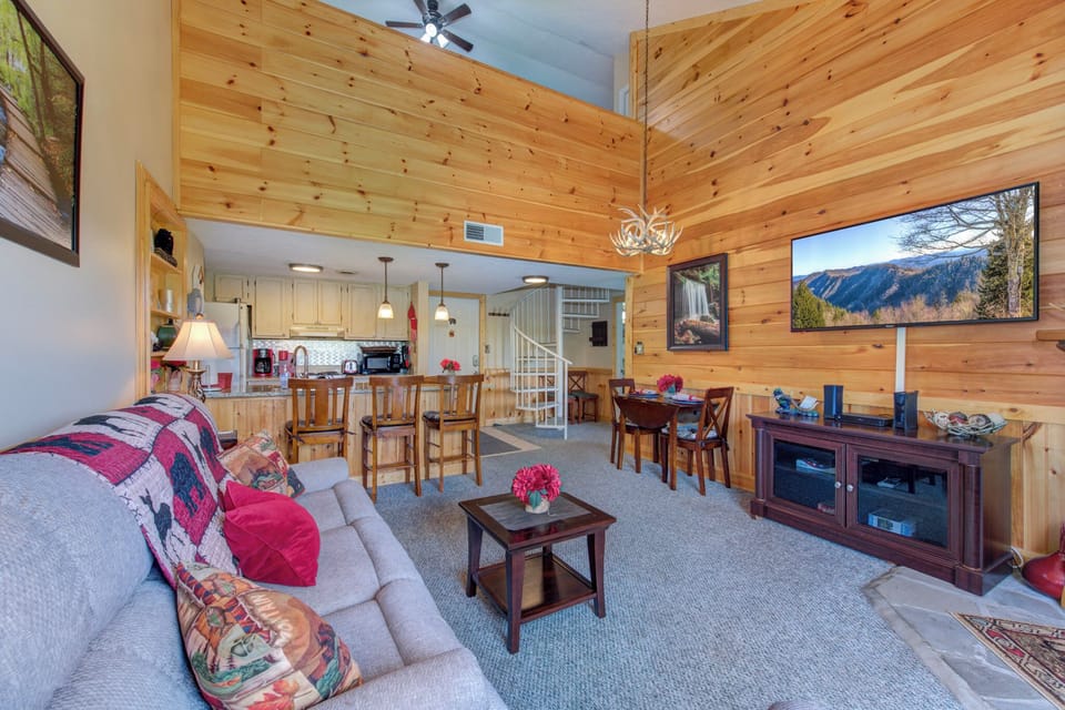 Living room with view of the loft above