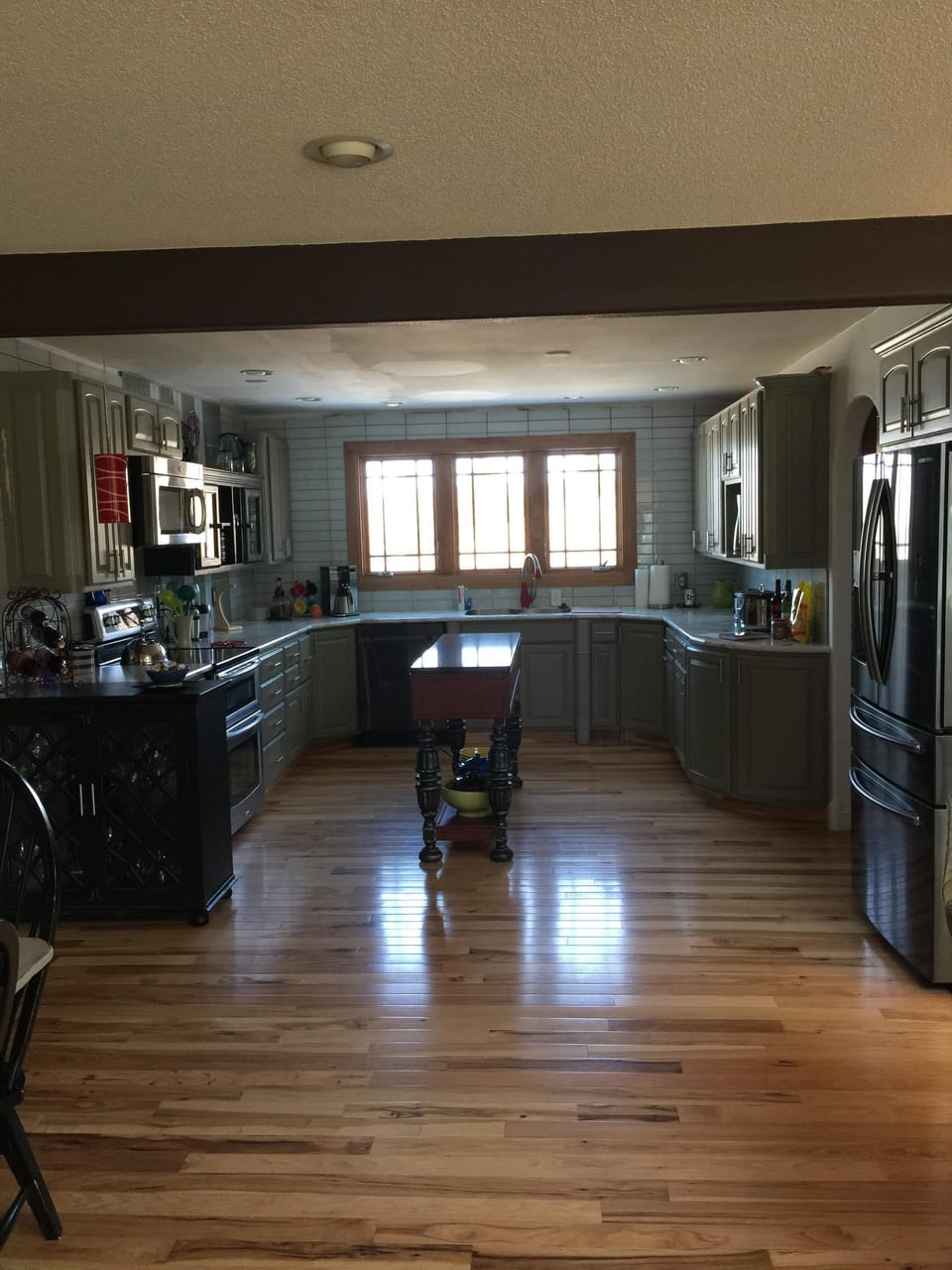 new kitchen updates including enlargement, window, tilework, appliances etc.
