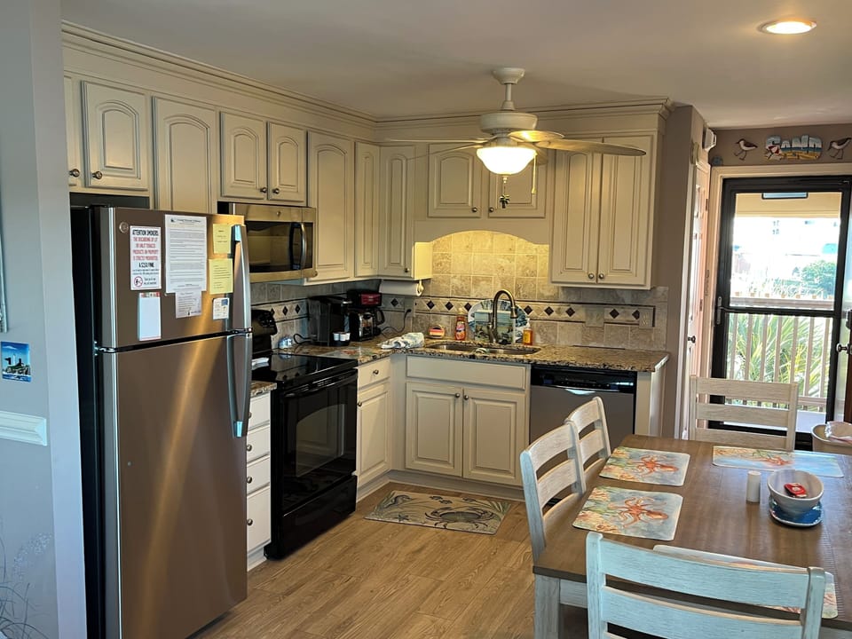 Kitchen with table and six chairs