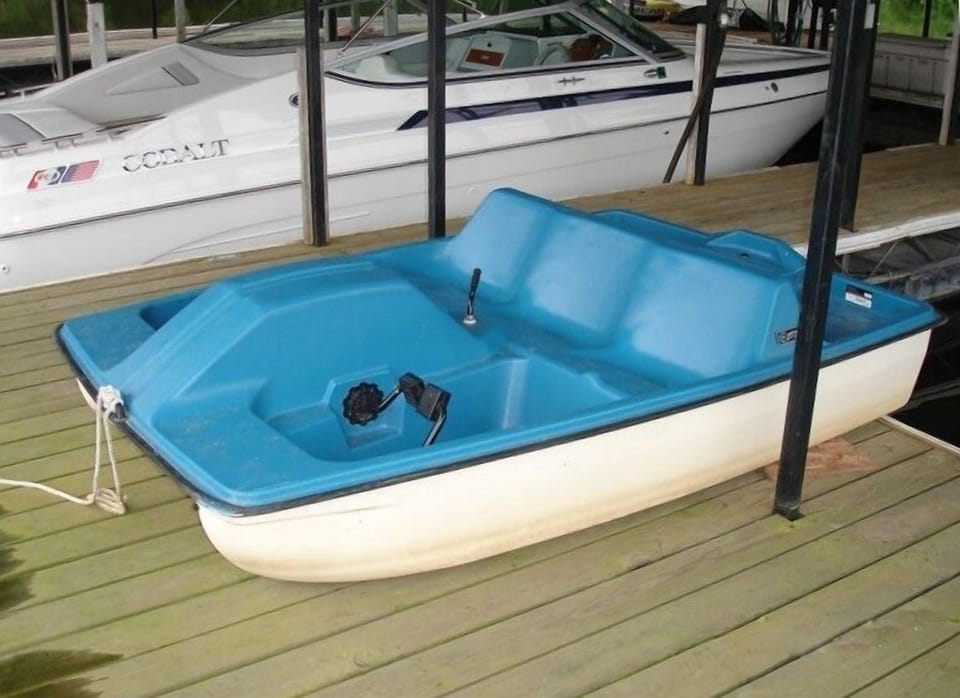 Paddle boat in quiet cove