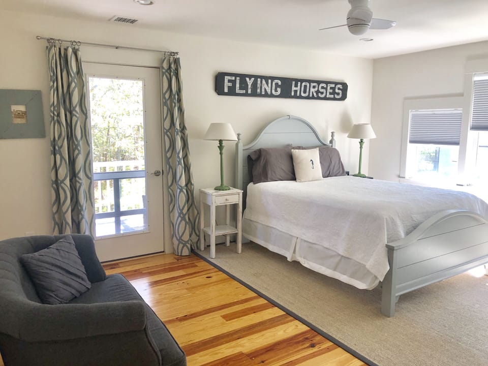 Primary Bedroom. Second Floor. Private Porch. Queen Bed. 