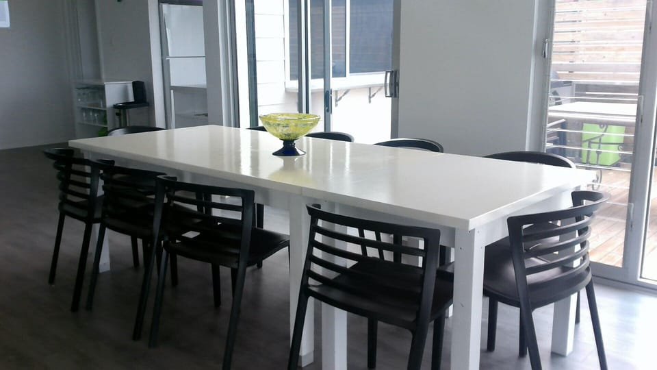 10 seater indoor dining adjacent kitchen and outdoor BBQ   