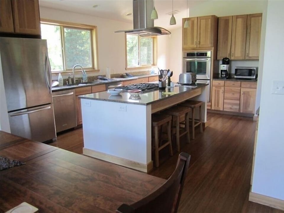 Seating at the cook top island, double ovens, microwave etc. 