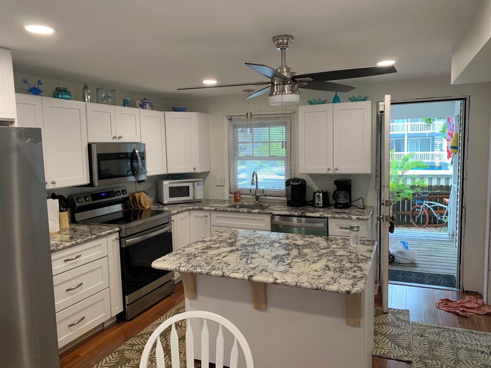 Brand New Kitchen in 2023.  With convenient extra seating at 'dinette table'.