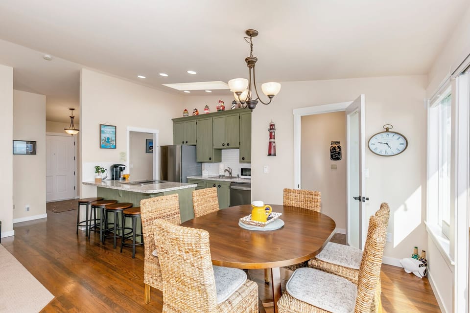 The dining room offers a sweeping bay view for every meal!