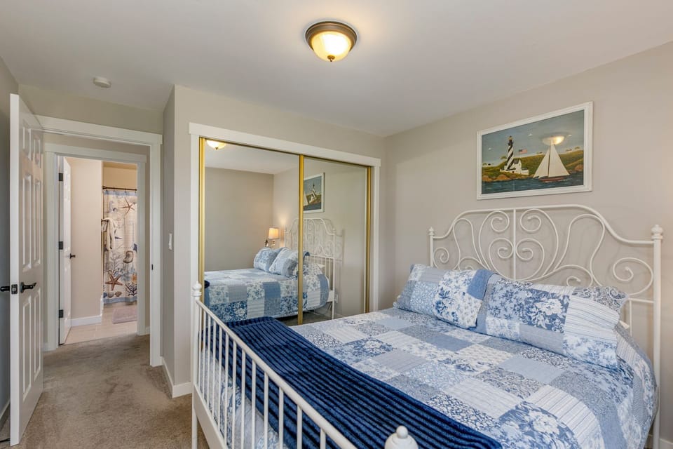 The Queen bedroom is conveniently located across the hall from a full bathroom.