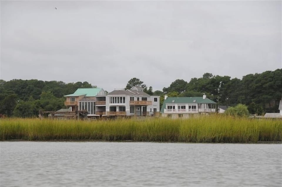 Views of Eureka! and neighboring Epiphany from far across the marsh