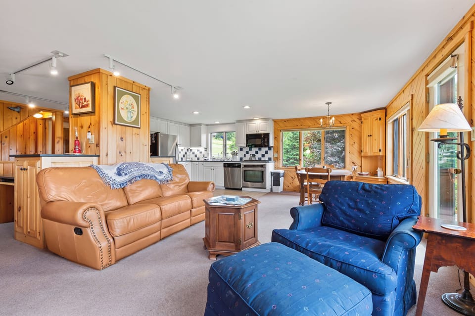 Open living, dining, and kitchen area