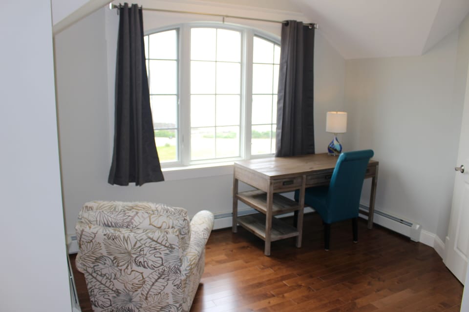 Master sitting area with desk and chair. Ocean view!