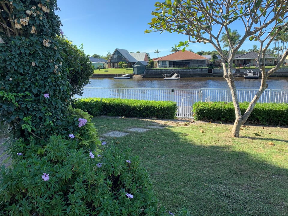 fron rear yard overlooking canal