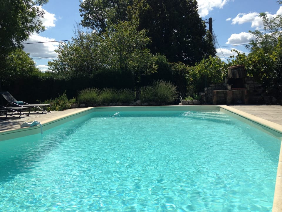 Secluded pool area surrounded by hedges... it's all yours to enjoy.