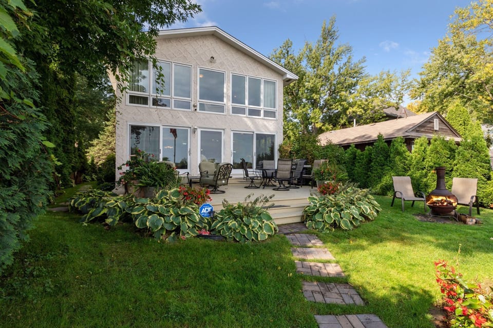 SUNNY DECK 6AM-3PM, UMBRELLA ON TABLE , CUSHION & ROCKER CHAIRS,  GAS GRILL 