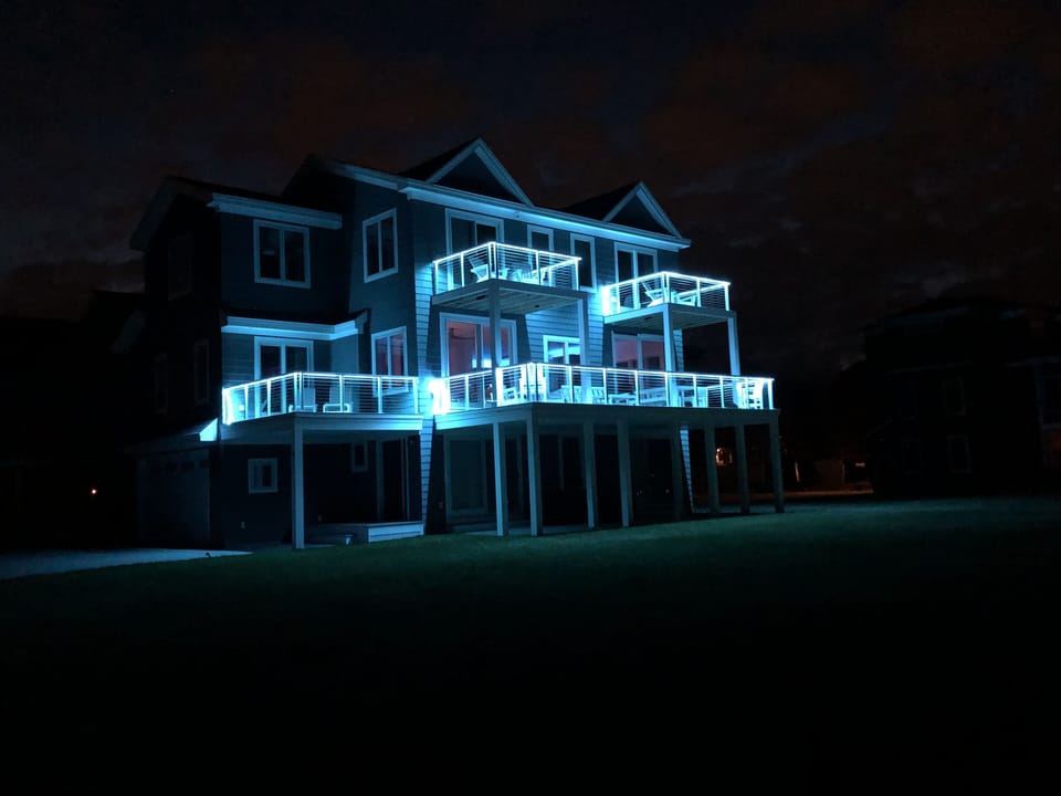 At night the lights come alive with resort style deck lighting.