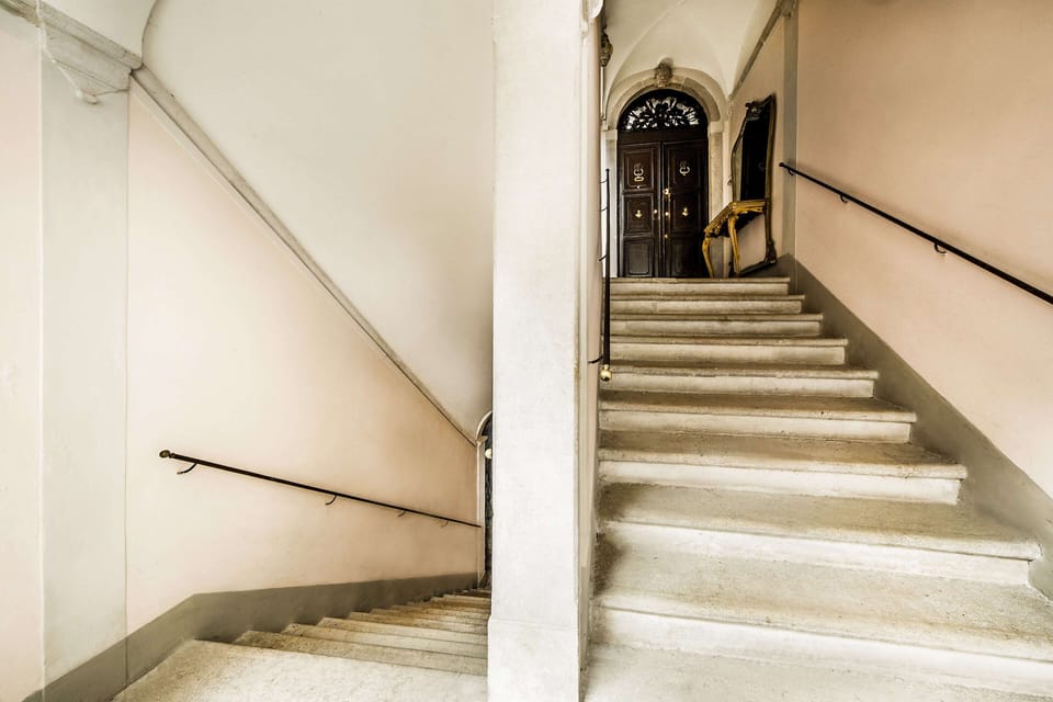 The staircase and the entrance door on 1st floor
