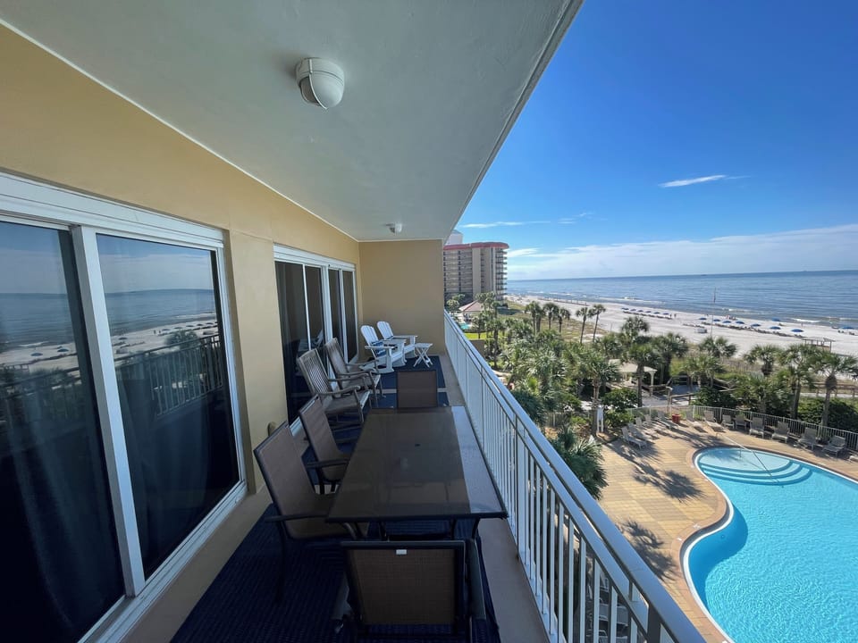 Large balcony with dining table and ample seating