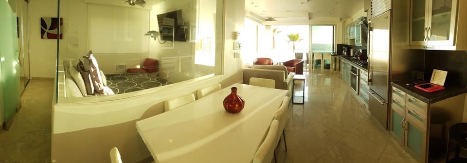 Great room area opens up to the beach.