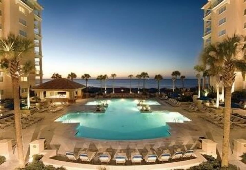 Oceanfront pool at dusk