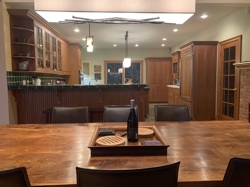 looking from dining room table to kitchen