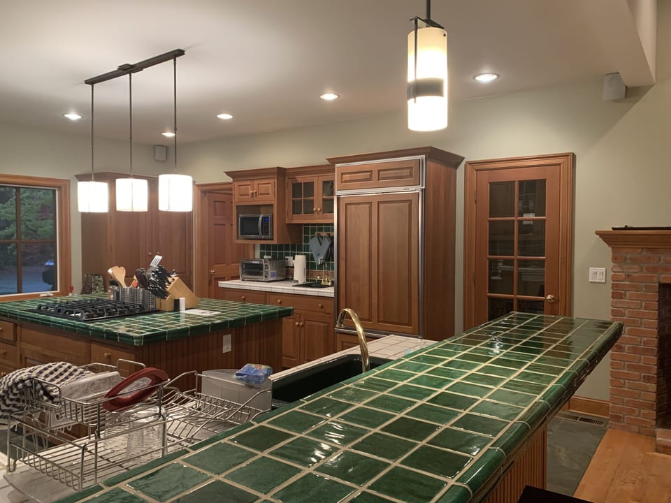 looking from tall kitchen island into kitchen 
