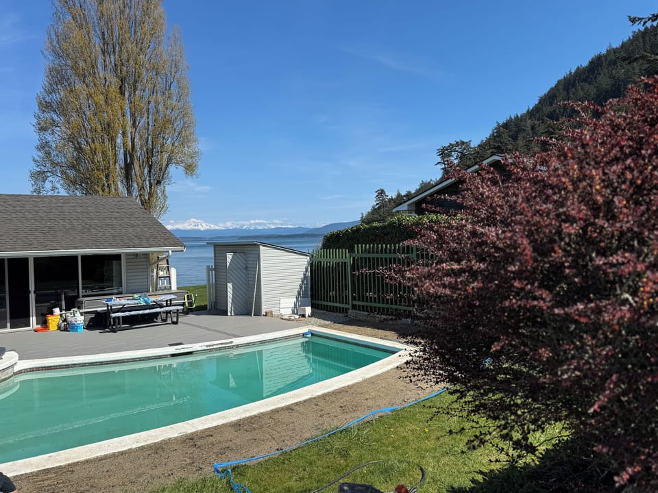 View from backyard. Ping pong, cornhole…