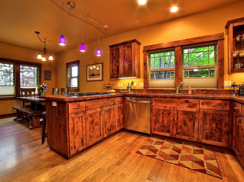 Kitchen with exquisite cabinetry and ample space