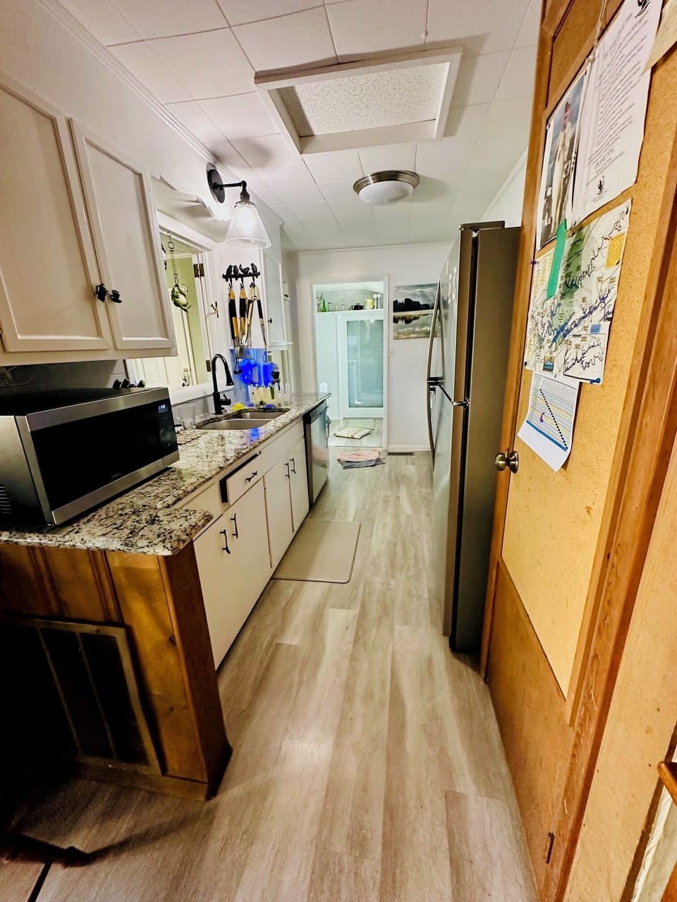 kitchen with stainless appliances, new microwave/convection/air-fryer.