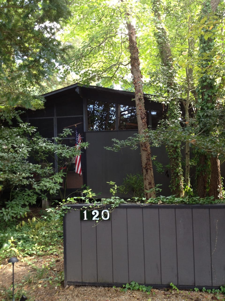 Less than two blocks to the beach, nestled under the trees. 